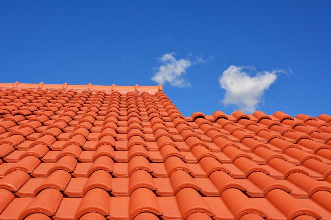 Clay tiles are another durable residential roofing option. 